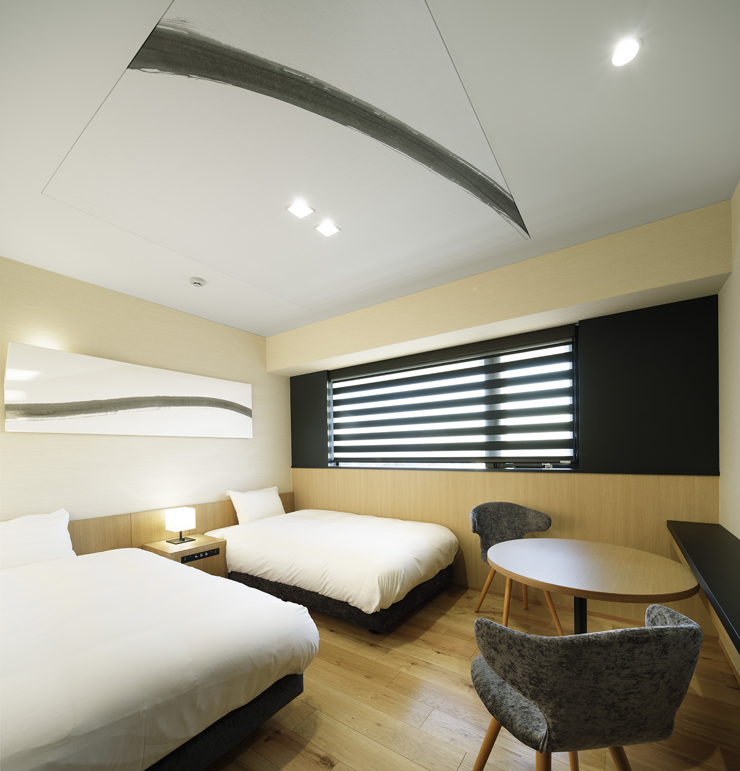 幅1,100mmのベッドを2台設置したツインルームは、2名様で快適にお泊まりいただけます。